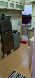 Kuchyň nebo kuchyňský kout v ubytování KT Harmoni Homestay