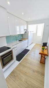Η κουζίνα ή μικρή κουζίνα στο Apartamento Praia