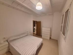 Postel nebo postele na pokoji v ubytování Casa Rural, masia antiga en rehabilitació, Mas Graells