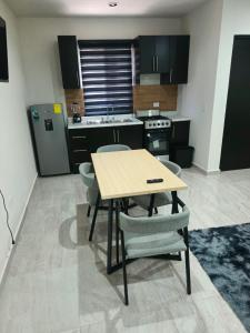 Kuchyň nebo kuchyňský kout v ubytování Torre Luna INT 7