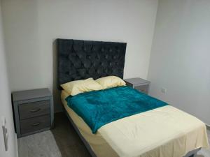 Postel nebo postele na pokoji v ubytování Torre Luna INT 7