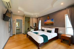 TV a/nebo společenská místnost v ubytování Mina Resort and Spa