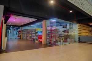 a store aisle with a large display of products at Twin Tower Hotel & Residence in Surabaya
