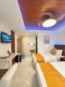 Μια τηλεόραση ή/και κέντρο ψυχαγωγίας στο Hotel Adelina Balanga City Bataan