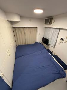 Voodi või voodid majutusasutuse La Parfait de Sapporo 814 Sapporo Station 6-minute walk from Sapporo Station toas +12 fotot