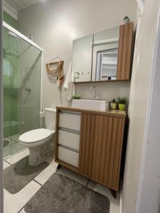 Ένα μπάνιο στο Ótima suíte privada em Torres