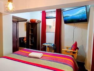 Ένα ή περισσότερα κρεβάτια σε δωμάτιο στο ECOTERRA-SAN FRANCISCO Cusco