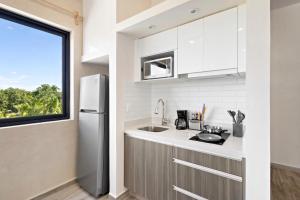 Kuchyň nebo kuchyňský kout v ubytování Wayra Condos