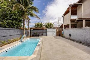 Swimmingpoolen hos eller tæt på Refúgio do Litoral , Casa com Piscina Privativa