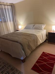 Ένα ή περισσότερα κρεβάτια σε δωμάτιο στο Hostal Mundet