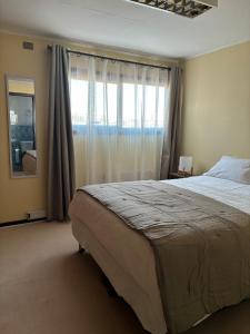 Ένα ή περισσότερα κρεβάτια σε δωμάτιο στο Hostal Mundet +13 φωτογραφίες