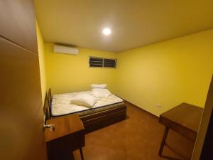 Postel nebo postele na pokoji v ubytování Pura Vida - Villa Lisa