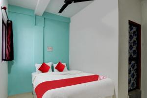 Postel nebo postele na pokoji v ubytování Hotel O Kings