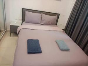 Postel nebo postele na pokoji v ubytování 水系泳池景色/Arcadia公寓/市中心出行便利 + 19 fotografií