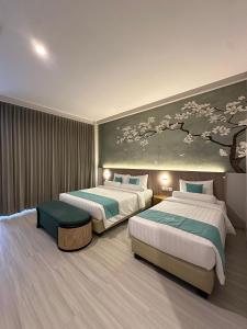 Postel nebo postele na pokoji v ubytování Anaya Azana Hotel & Villa Tawangmangu