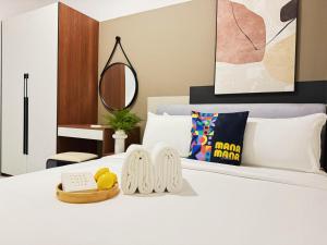 Ένα ή περισσότερα κρεβάτια σε δωμάτιο στο Majestic Suites KLCC by Mana-Mana +41 φωτογραφίες