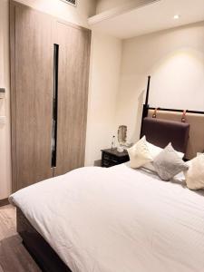 Ένα ή περισσότερα κρεβάτια σε δωμάτιο στο Cloud stay