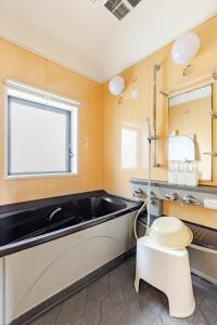 Ένα μπάνιο στο Hrk富士宮内房