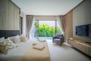 Postel nebo postele na pokoji v ubytování 3 BDR Zenithy pool villa - 10 min to the beach