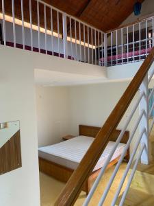 Ένα ή περισσότερα κρεβάτια σε δωμάτιο στο Niral Farms