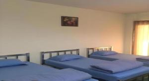 Ένα ή περισσότερα κρεβάτια σε δωμάτιο στο V.R.Mansion Hotel +39 φωτογραφίες