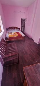 Postel nebo postele na pokoji v ubytování The Kodai Mist Valley