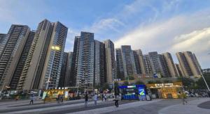 a group of tall buildings in a city at PAI Hotel·Huazhou Bus Terminal in Dongshan