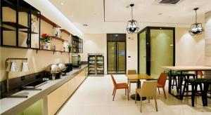 Kuchyň nebo kuchyňský kout v ubytování City Comfort Inn Nanning Nanhu Park Art College