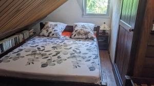 Ένα ή περισσότερα κρεβάτια σε δωμάτιο στο MADERA