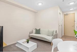 Χώρος καθιστικού στο Skytower View With Swimming Pool and Gym +18 φωτογραφίες