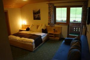 Llit o llits en una habitació de Bergfeuerhof