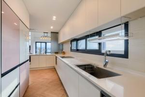 Η κουζίνα ή μικρή κουζίνα στο 위드유하우스