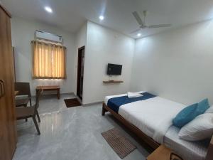 Una cama o camas en una habitación de Hotel O Gopalan Mall Bangalore Formerly Gm Comforts 14 fotos más