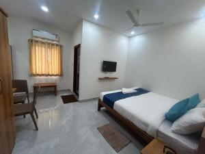 Un pat sau paturi într-o cameră la Hotel O Gopalan Mall Bangalore Formerly Gm Comforts