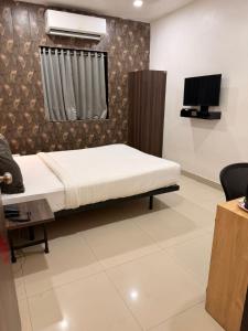 Μια τηλεόραση ή/και κέντρο ψυχαγωγίας στο Hotel Lotus