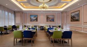 Posezení v ubytování Vienna Hotel Jiangsu Zhangjiagang Passenger Terminal Station