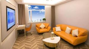 Posezení v ubytování Vienna Hotel Jinan Beiyuan Street Red Star Macalline