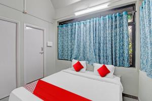 Ένα ή περισσότερα κρεβάτια σε δωμάτιο στο Super Hotel O Moonlight Inn