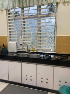 Η κουζίνα ή μικρή κουζίνα στο Magnolia homestay 2 +9 φωτογραφίες