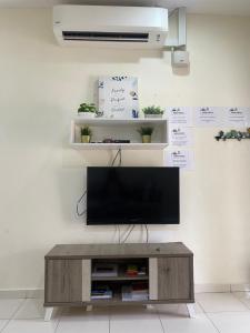 Μια τηλεόραση ή/και κέντρο ψυχαγωγίας στο Magnolia homestay 2