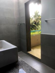 Koupelna v ubytování Sithagi River Front