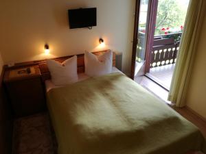 Postel nebo postele na pokoji v ubytování Haus Mansaura + 37 fotografií