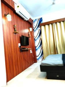 TV a/nebo společenská místnost v ubytování Kara Casa