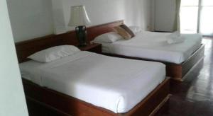 Postel nebo postele na pokoji v ubytování Malai - Asia Resort Tabsakae