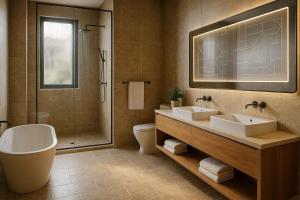 a bathroom with two sinks and a shower at Wenjin Culu in Elbasan