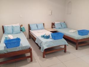 Postel nebo postele na pokoji v ubytování Suíte Ponte da Amizade