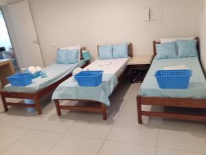 Postel nebo postele na pokoji v ubytování Suíte Ponte da Amizade