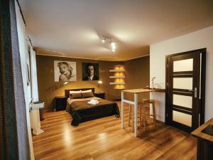 Posteľ alebo postele v izbe v ubytovaní Apartament Focha 26
