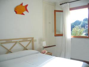 Кровать или кровати в номере Belvedere Residenza Mediterranea