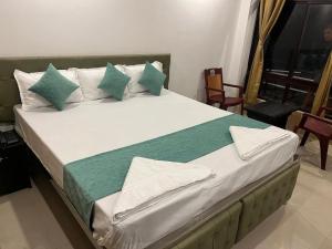 Voodi või voodid majutusasutuse Vedangan Resort Sittong toas +5 fotot